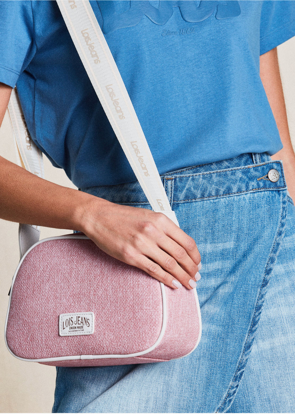 Bandolera ajustable logo frontal bolsillo trasero rosa