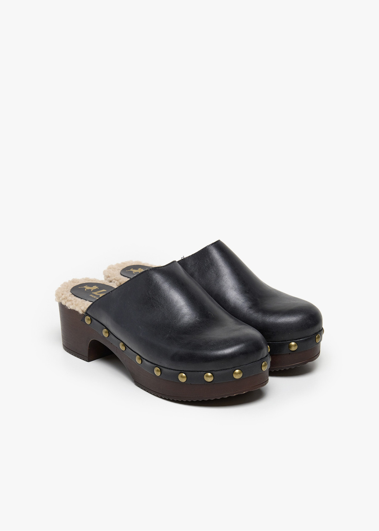 Zuecos de piel con imitación borreguillo negro