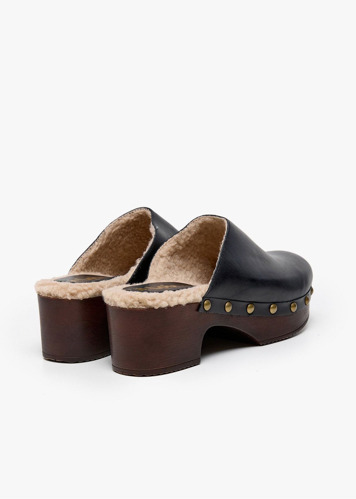 Zuecos de piel con imitación borreguillo negro