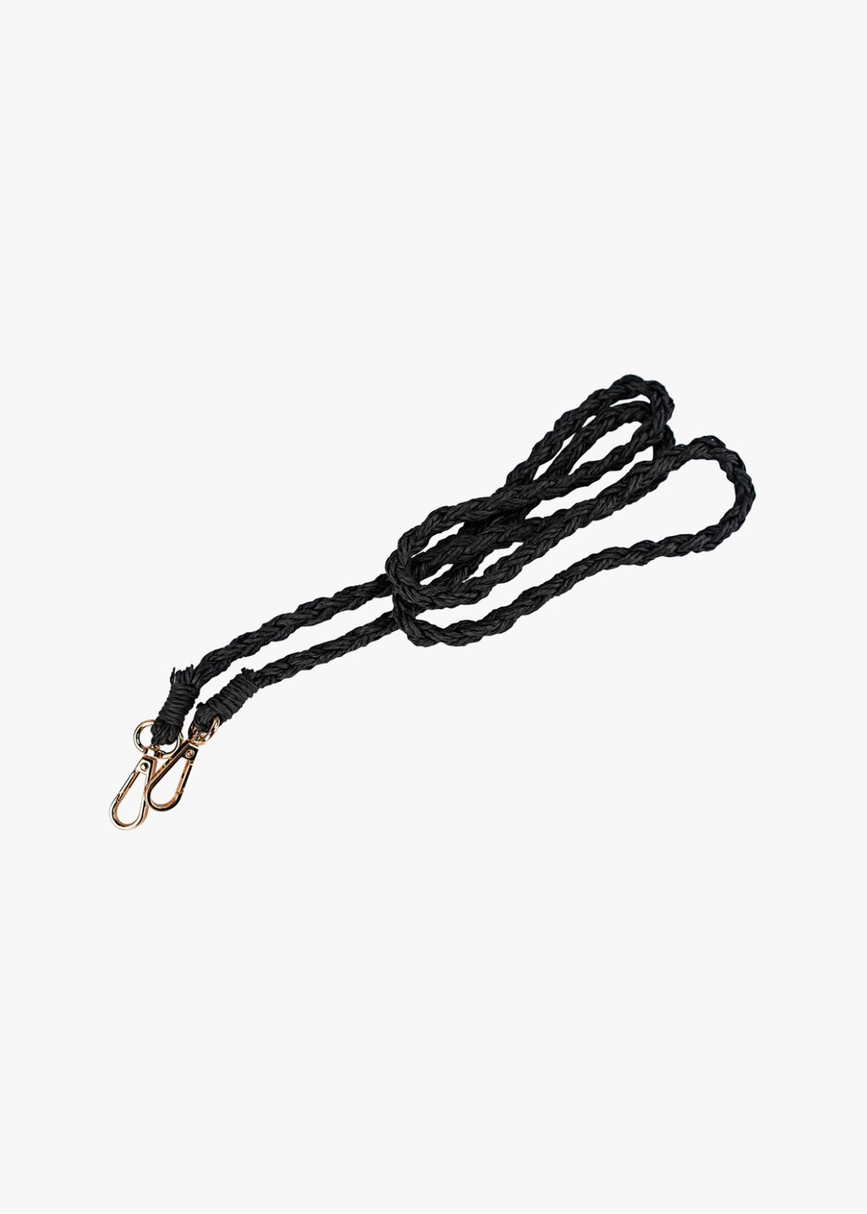 Bandolera redonda con textura trenzada detalle borla lateral negro