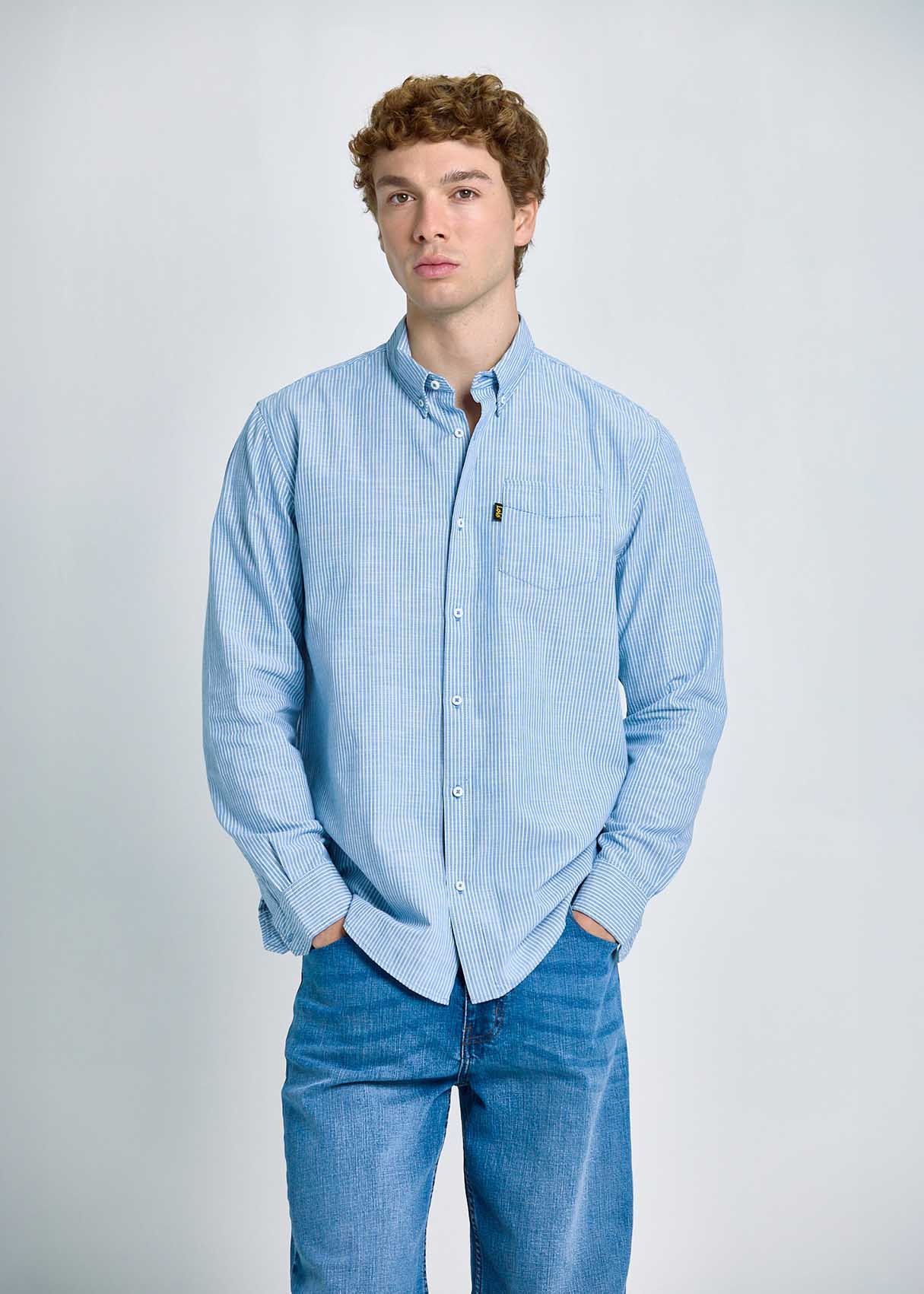 Camisa Rayas Verticales Bolsillo Frontal Azul