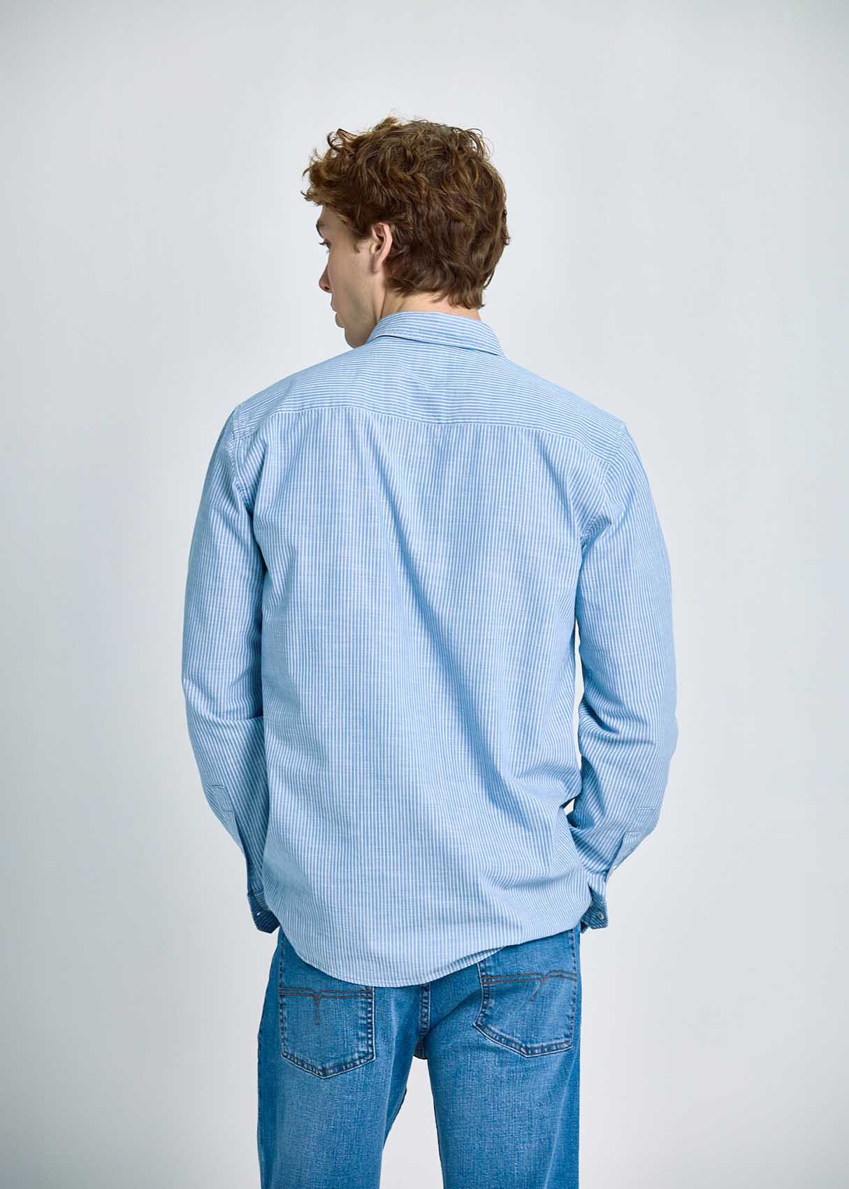 Camisa Rayas Verticales Bolsillo Frontal Azul