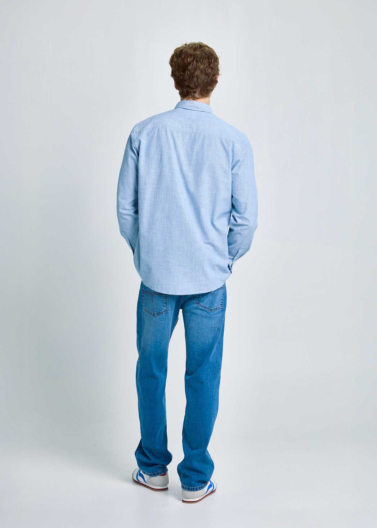 Camisa Rayas Verticales Bolsillo Frontal Azul